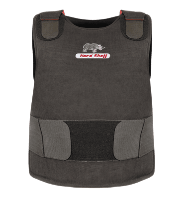 Man wearing a black Hard Shell concealable vest - low pro for personal protection and concealed body armor safety